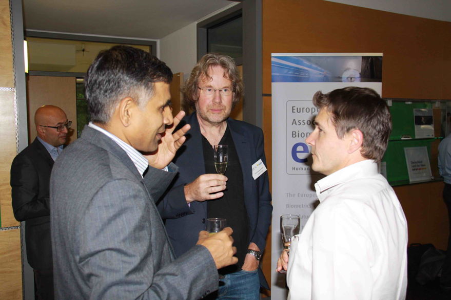 [Photo] Impressions from the reception: Ajay Kumar in discussion with Jean-Christophe Fondeur and Raymond Veldhuis